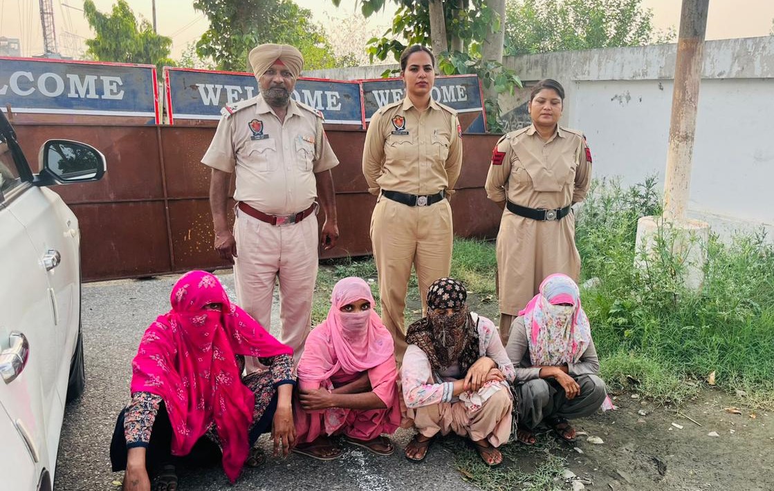 Four migrant women arrested for stealing items from devotees in a religious place.