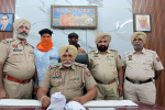 Two smugglers arrested with heroin, drug money  