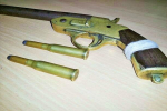 Villager arrested with illegal firearm.