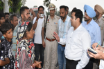 DC meets flood-hit people in Lohian Khas  villages, distributes ration and tarpaulins