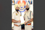 Punjab police DGP Gaurav Yadav honours SP (Investigation) Harwinder Singh for rendering valauable service during Ghalughara week